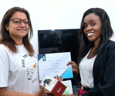 Visualdo Institute graduation ceremony with students proudly holding certificates in Media, Art & Design, Technology, Health, Business, and Hospitality courses