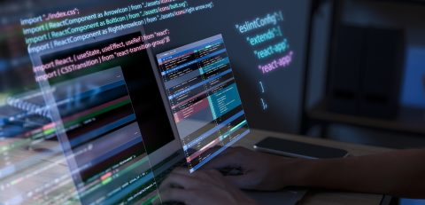programming-background-with-person-working-with-codes-computer programming-background-with-person-working-with-codes-computer
